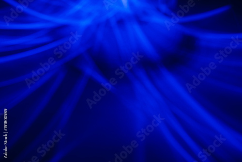 background of chaotic lines/ Abstract blue background of chaotic lines of tubes with neon glow