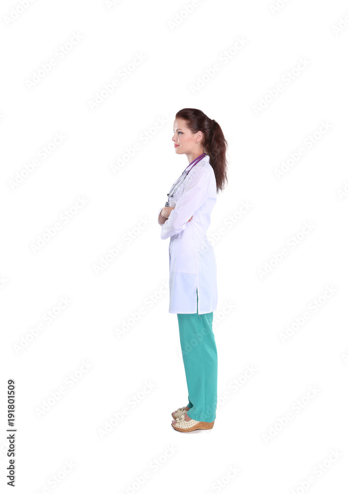 Smiling female doctor with a folder in uniform standing at hospital. Smiling female doctor Smiling female doctor with a folder in uniform standing at hospital. Smiling female doctor