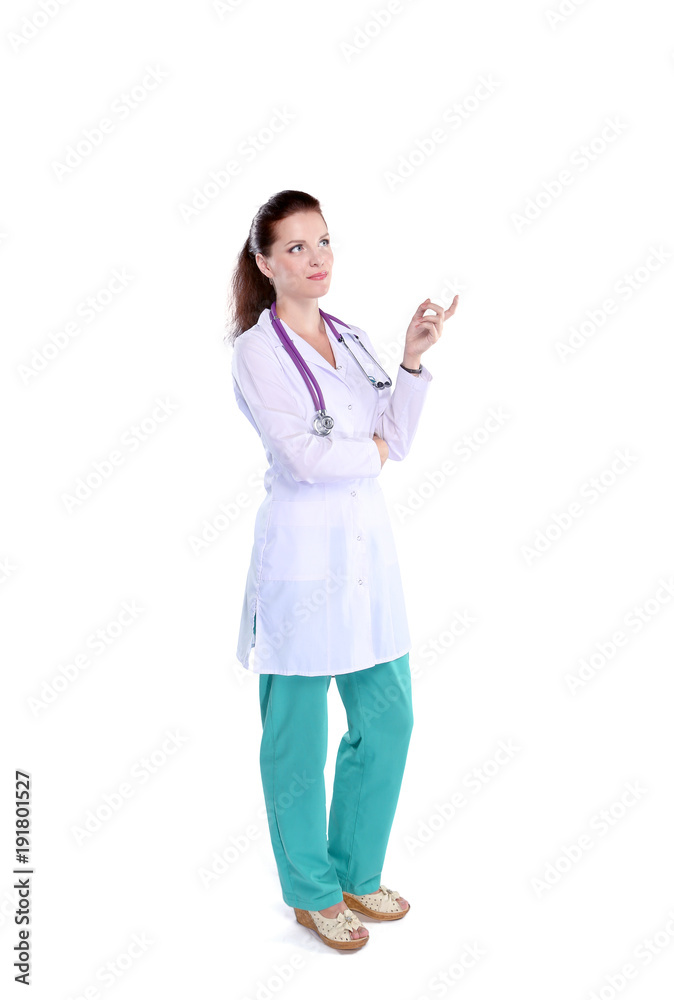 Smiling female doctor with a folder in uniform standing at hospital. Smiling female doctor Smiling female doctor with a folder in uniform standing at hospital. Smiling female doctor