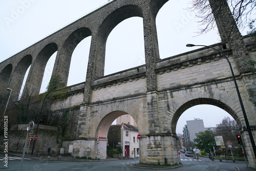 Paris, France-January 21, 2018: The aqueduct between the towns Arcueil and Cachan on the South of Paris, built under Henry IV.

