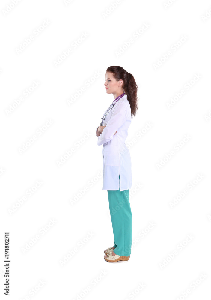 Smiling female doctor with a folder in uniform standing at hospital. Smiling female doctor Smiling female doctor with a folder in uniform standing at hospital. Smiling female doctor
