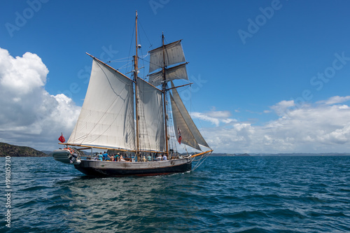 Traditional Sailing boat On Calm Blue Seas 