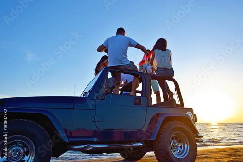 Photography Group of happy friends making party in car - Young people having fun drinking ch