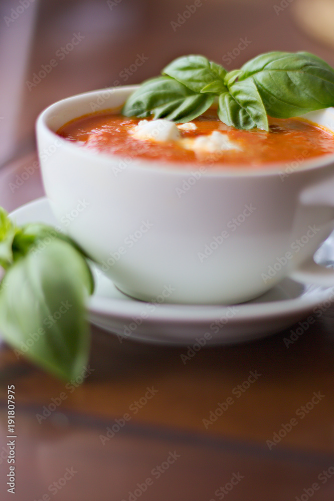 Creamy tomato soup with mozzarella and basil Creamy tomato soup with mozzarella and basil