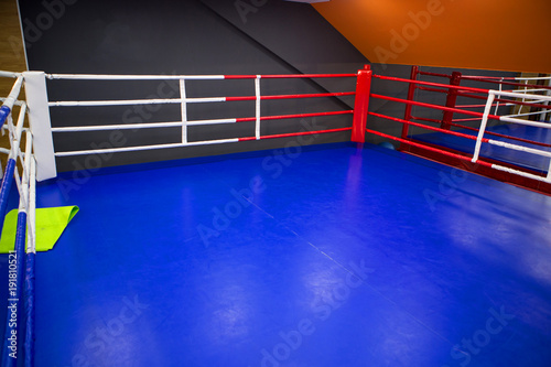 boxing gym in fitness center. Training boxing hall. Punching bag. Boxing ring. Empty boxing hall
