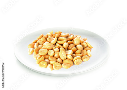 Coffee beans in white plate on white background