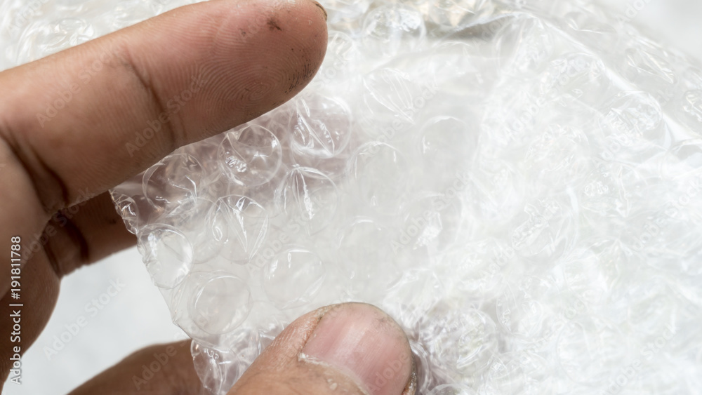 Close up White air bubble warp with hand