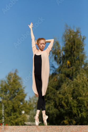 Ballerina dancing outdoors