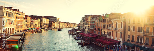 Grand Canal, Venice, Italy, called Canal Grande in Italian, as seen from Rialto Bridge. Beautiful view of sunset over the Venetian landmark river. Banner panorama background.