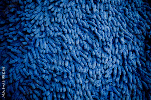 blue carpet.  blue fabric texture background. closeup