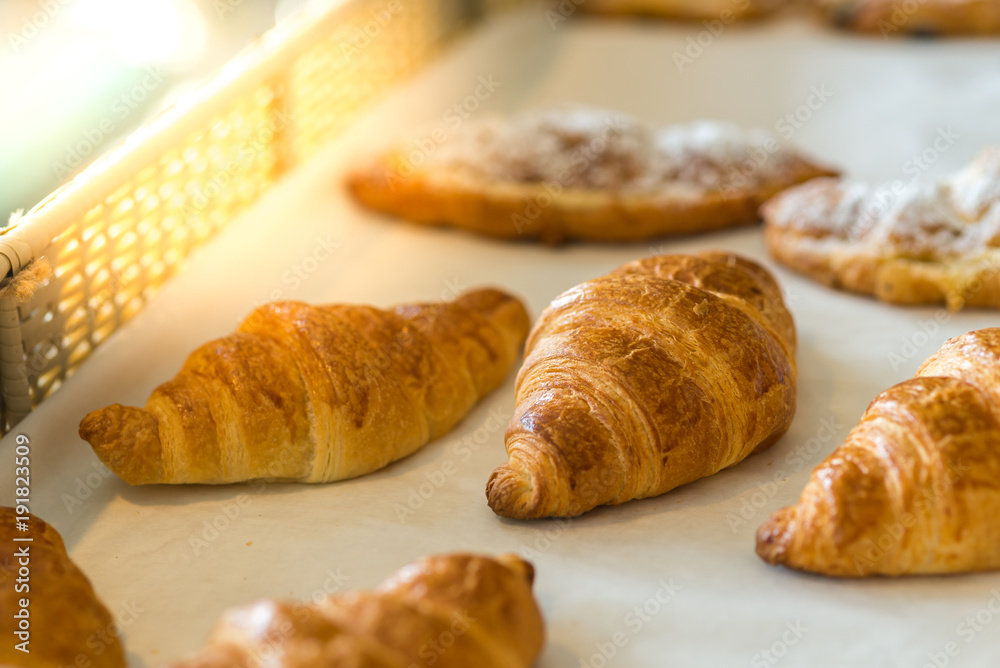 croissants in basket ready for sell. croissants in basket ready for sell.