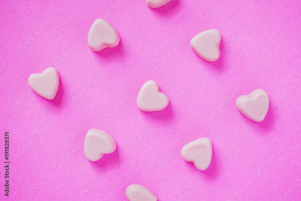 Fototapeta premium valentine candy hearts shape on pink background