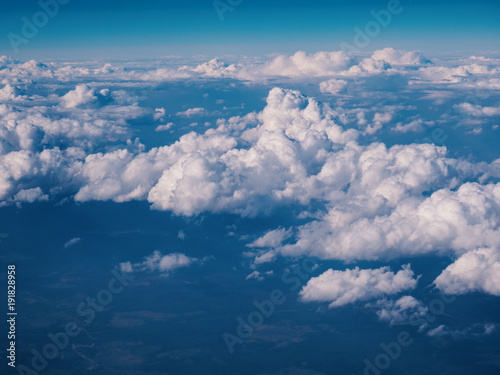 View from airplane at clouds.