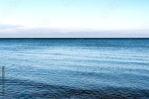 Obraz na plátně Still water in gulf of Riga, Baltic sea.