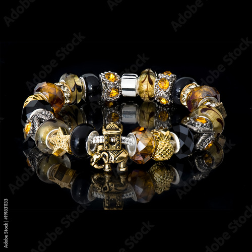 jewelry bracelet female glass crystal elements black background beautiful elegant multicolored handwork chain reflection