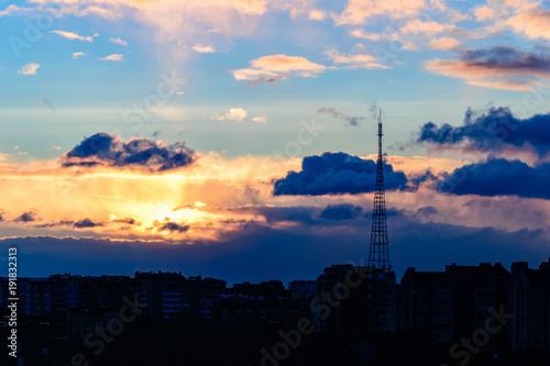 gold sunrise and dramatic sky over the city of Ivano-Frankivsk, Ukraine
