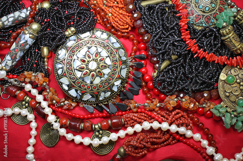 Background-east  jewelry with magnificent coral necklace and pearls 