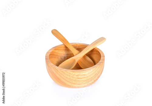 Wooden bowl wooden spoon on white background