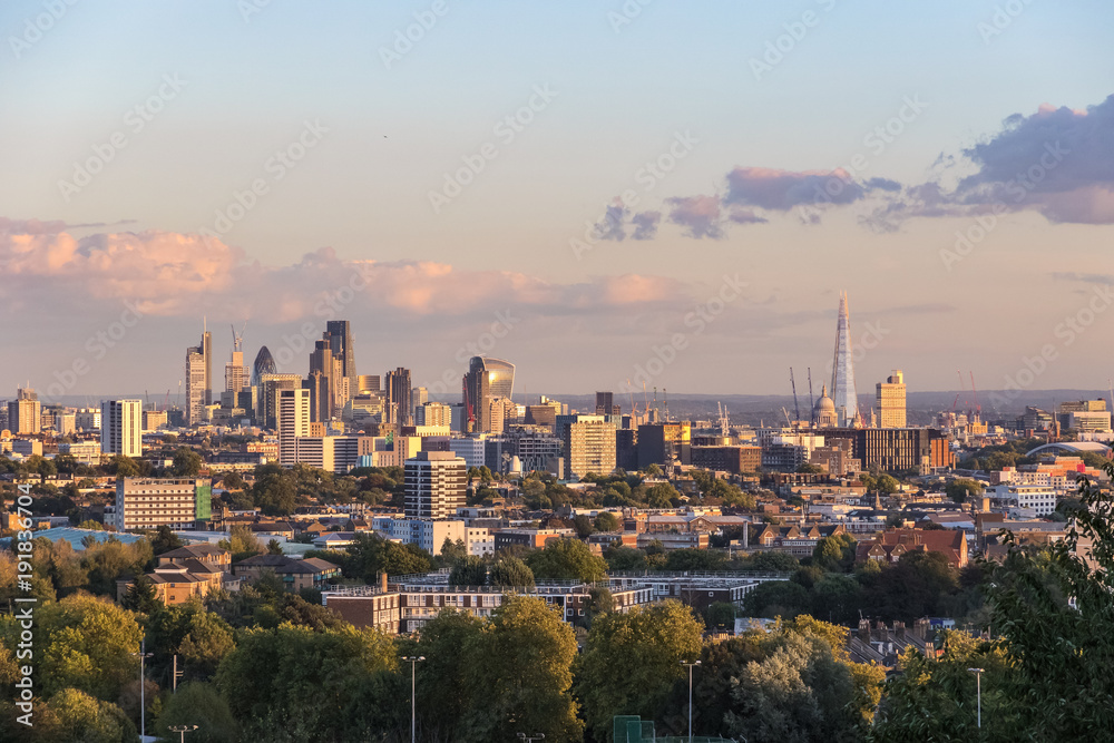 View of London city skyline at sunset from Parliament Hill at Hampstead Heath