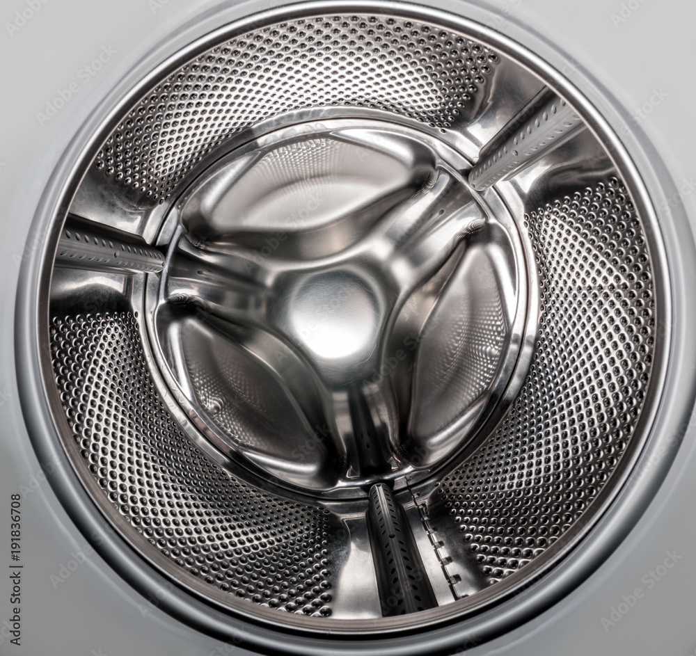 Washing machine. Inside of a washing machine drum. Stock Photo | Adobe Stock