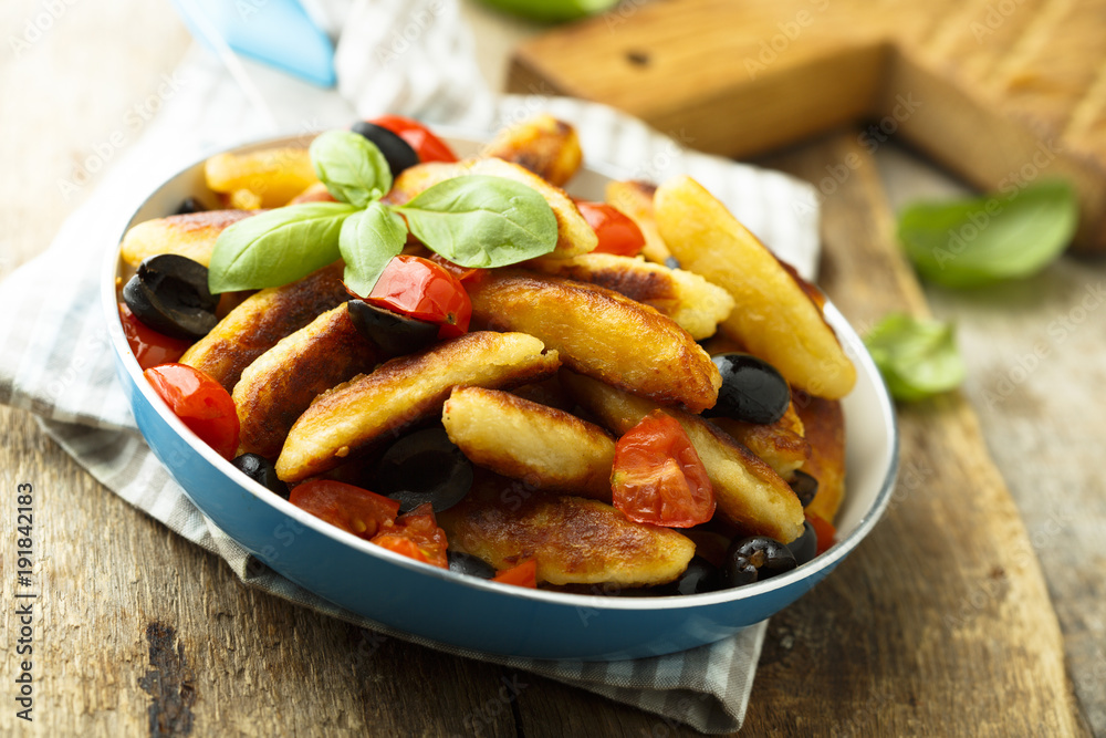 Potato noodles with olives and tomatoes Potato noodles with olives and tomatoes