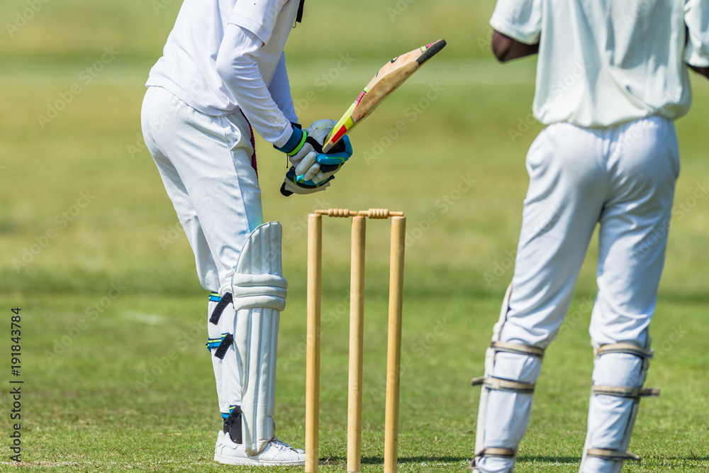 Obraz premium Cricket Action Batsman Ball Bowler Wicket Keeper Closeup unidentified.