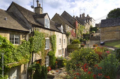 The picturesque old cottages of The Chipping Steps, Tetbury, Cotswolds, Gloucestershire, UK photo
