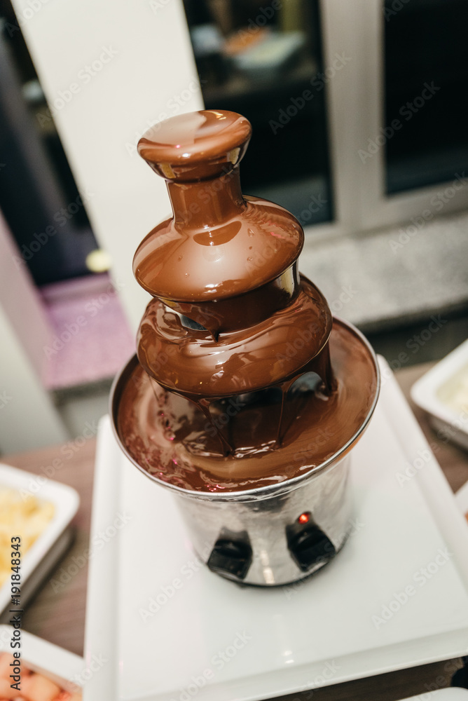Delicious chocolate fountain fondue Delicious chocolate fountain fondue