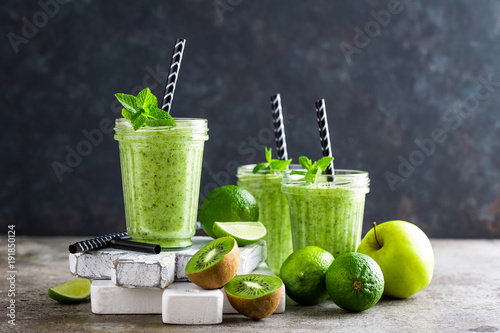 Smoothie with fresh green apple, kiwi and lime. Summer vitamin refreshing beverage. Healthy detox diet