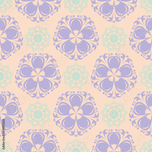 Multi colored floral seamless pattern. Beige background with violet and blue flower elements