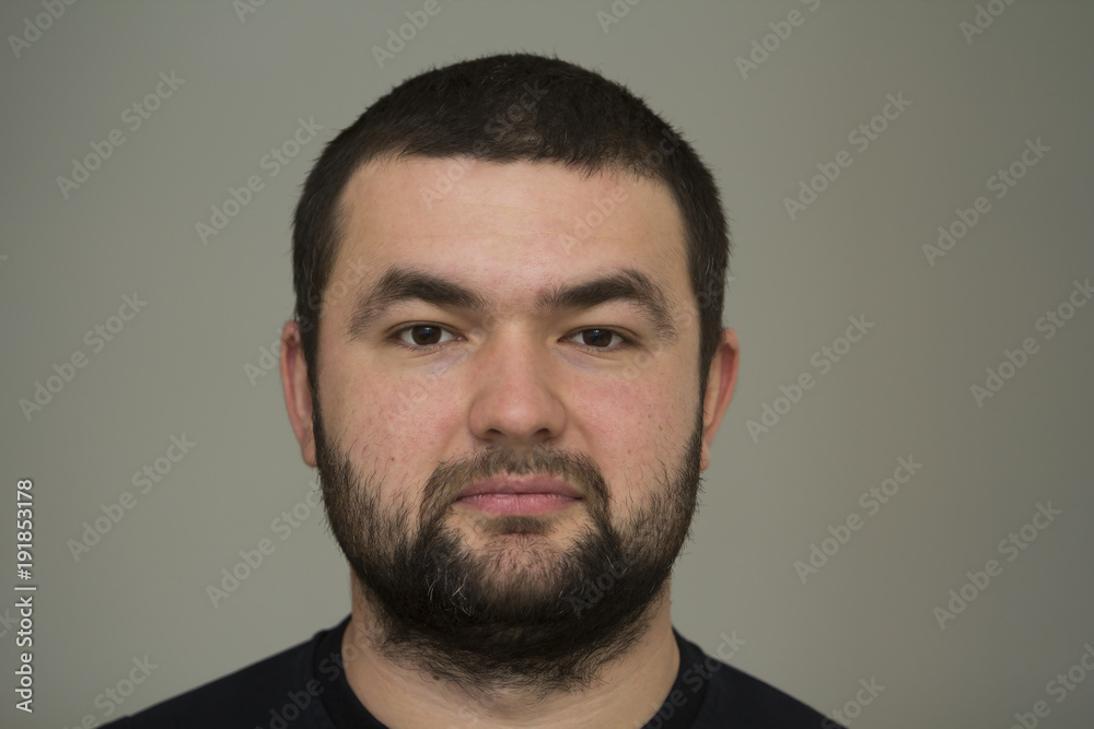 Obraz premium Portrait of a handsome young bearded man