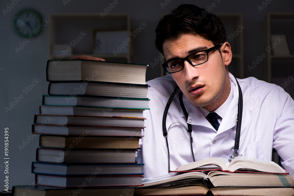 Medical student preparing for university exams at night Medical student preparing for university exams at night