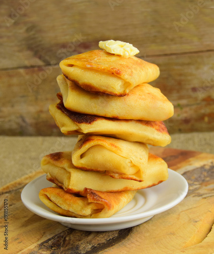 Obraz na plátne Pancakes are put by the hill on a plate