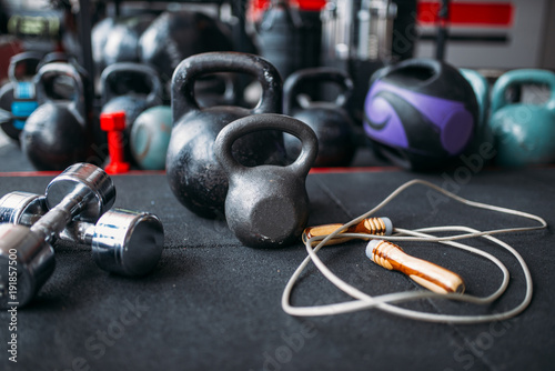Fototapeta Naklejka Na Ścianę i Meble -  Kettlebells and dumbbells closeup, sport equipment