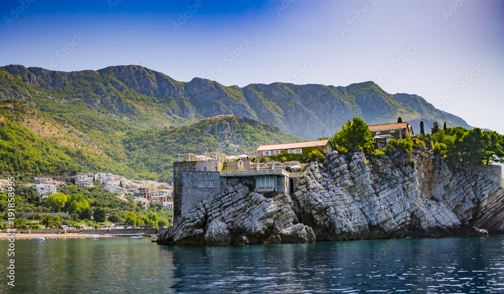 Old medieval houses on rock in sea, Balkans, Mediterranean Old medieval houses on rock in sea, Balkans, Mediterranean