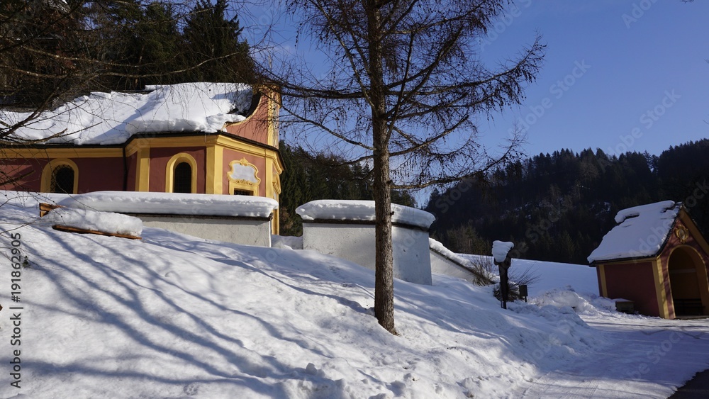 Maria Larch, Terfens, Eggen near Schwaz, Tyrol, Austria - pilgrimage church in winter 2018 with snow