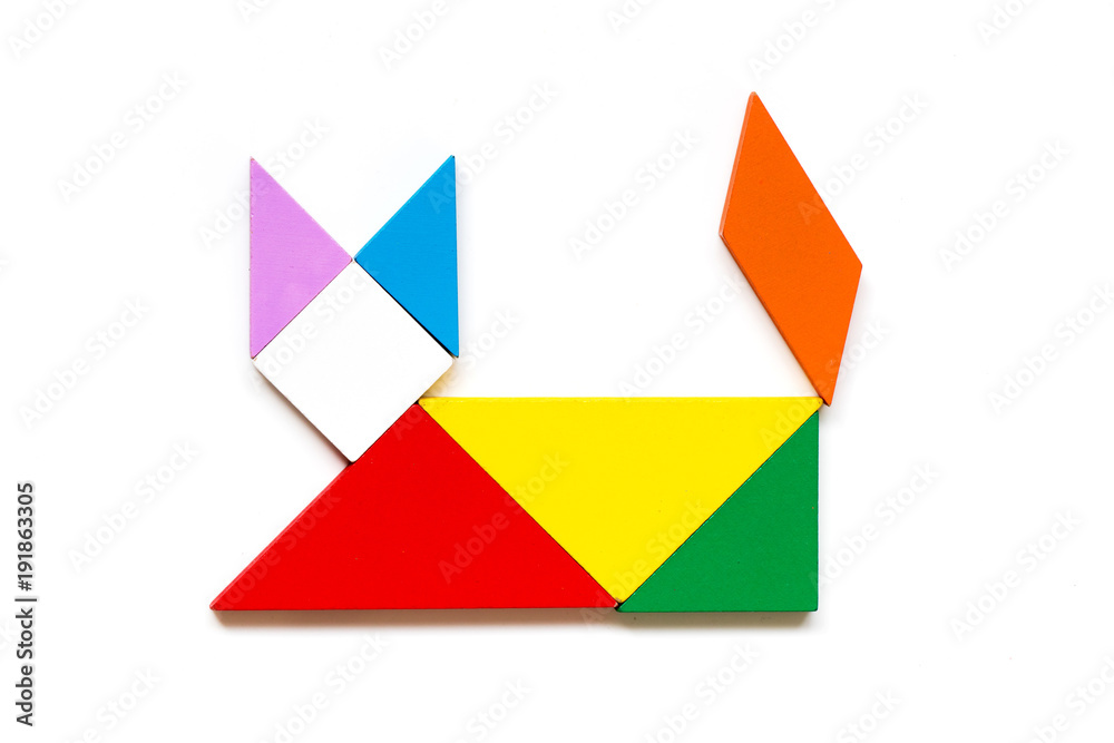 Color wood tangram puzzle in cat shape on white background Color wood tangram puzzle in cat shape on white background