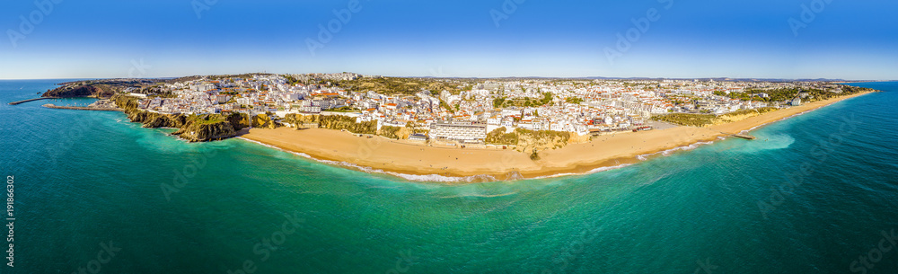 Panoramic view of wide beach and architecture in Albufeira, Portugal