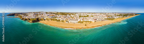 Panoramic view of wide beach and architecture in Albufeira, Portugal