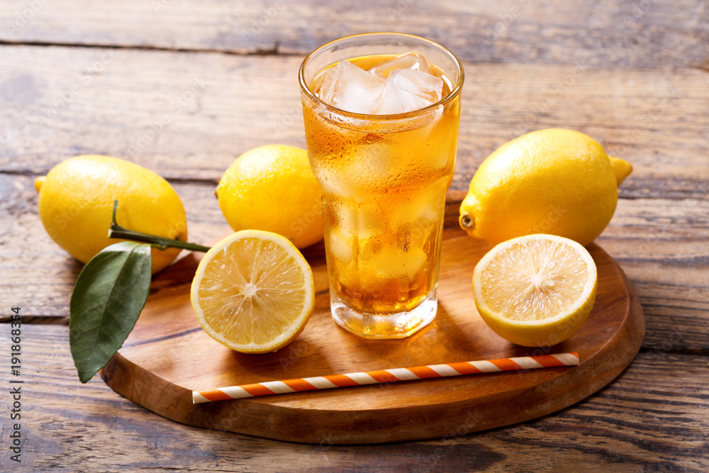 glass of lemon iced tea with fresh fruits glass of lemon iced tea with fresh fruits