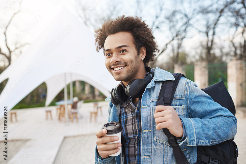 Holding top a backpack