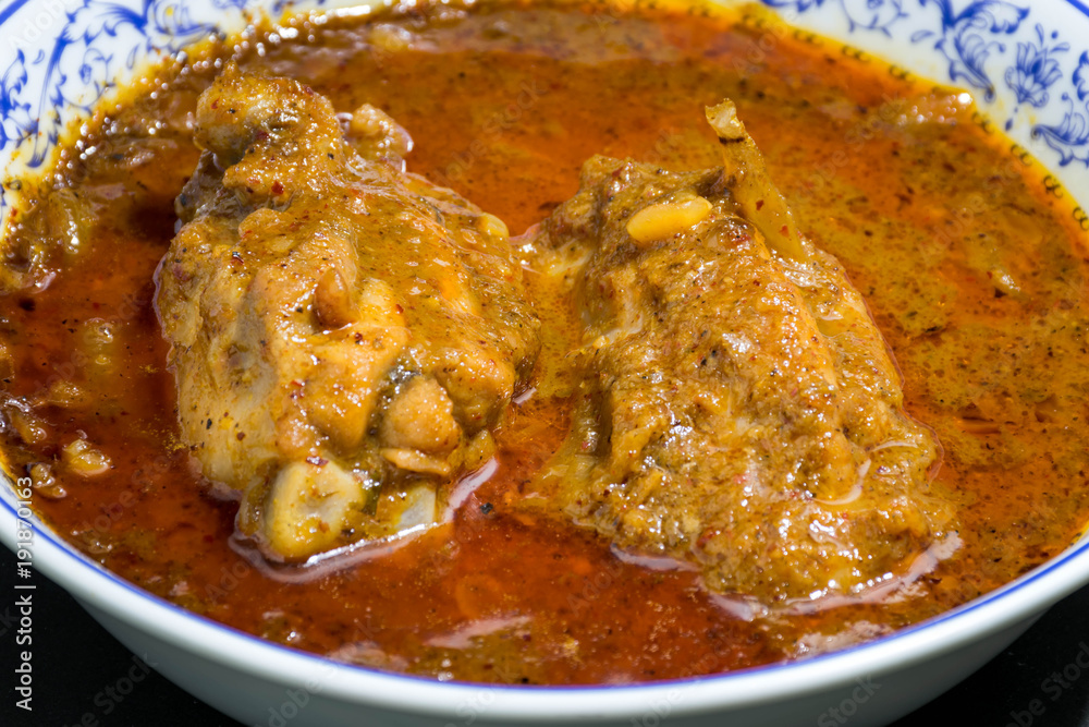 Thai massaman curry with chicken in a bowl