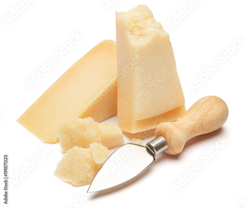 Piece of parmesan cheese on white background photo