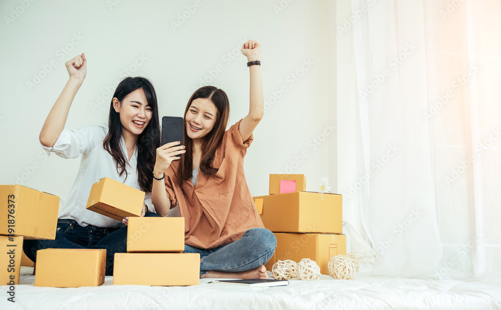 Young asian girl is freelancer with her private business at home office, working with laptop, coffee, online marketing. Young woman startup her SME business. Young asian girl is freelancer with her private business at home office, working with laptop, coffee, online marketing. Young woman startup her SME business.