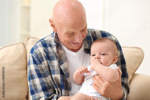 Senior man playing with his...