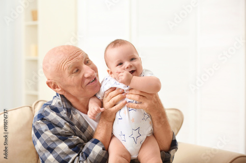 Senior man playing with his...