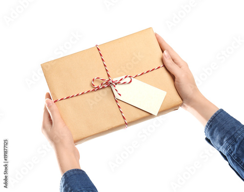 Woman with parcel gift box on white background © Africa Studio