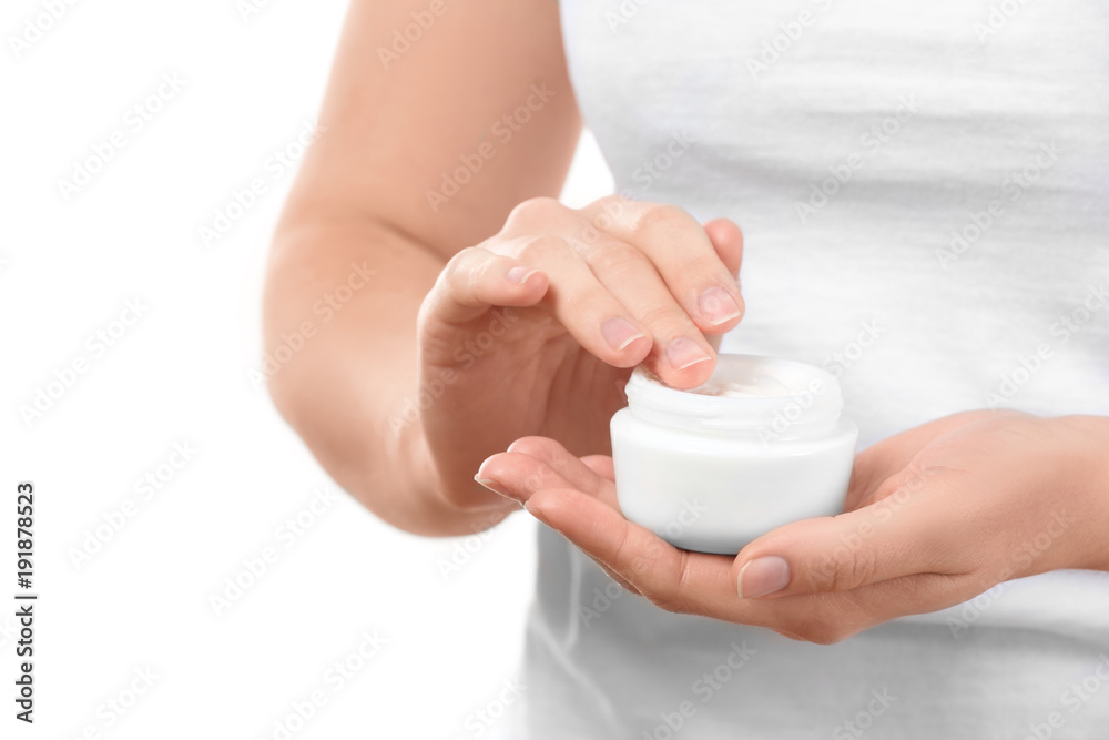 Woman with jar of body cream on white background Woman with jar of body cream on white background