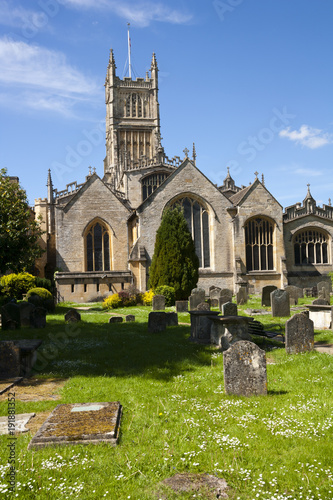 The historic Abbey Church and churchyard at Cirencester in the Cotswolds, Gloucestershire, UK