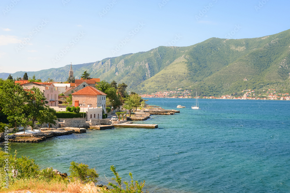 mountain architectural landscape, view from the sea to the village of Perast, Montenegro